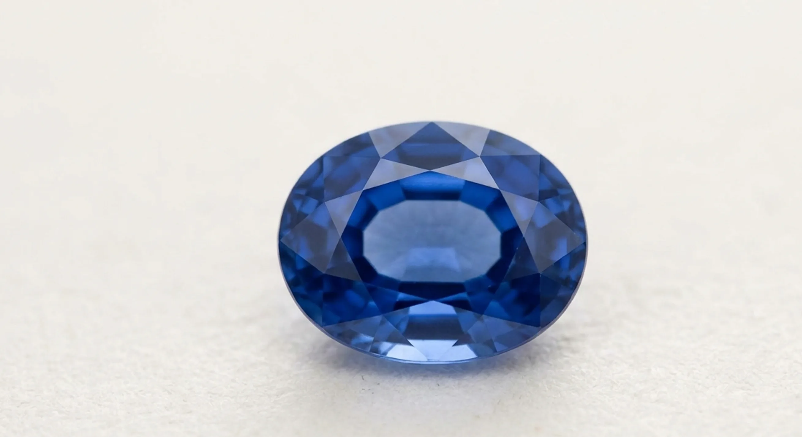 Face-up view of a vividly saturated even blue sapphire
